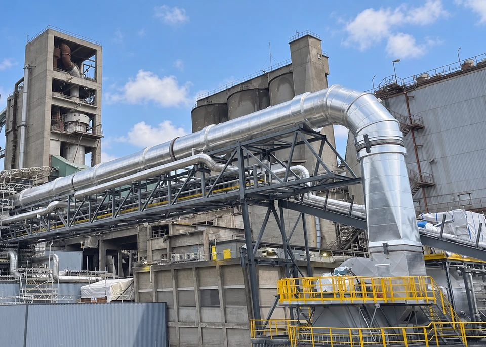 Large process ductwork at a cement carbon-capture installation.